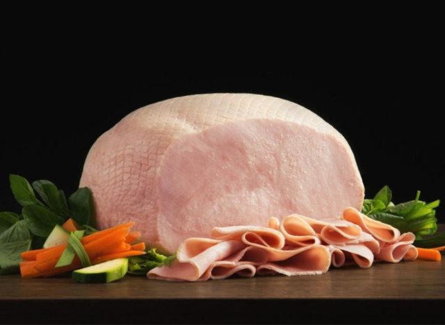 Boar's Head Low-sodium turkey on a table with a black background