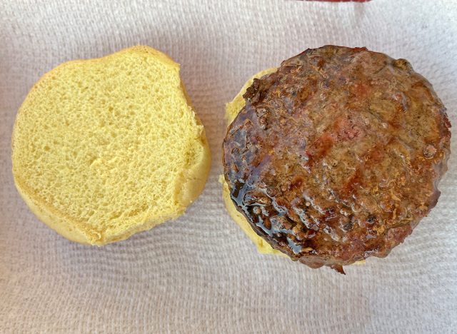 A fresh-grilled burger patty from Pat LaFrieda served on a bun