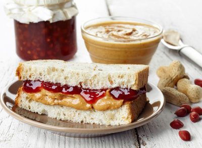 peanut butter and jelly sandwich on a plate