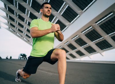 man doing lunges, concept of bodyweight exercises for men in their 40s