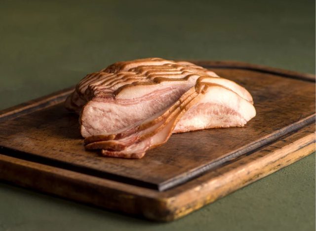 slices of Grass Roots bacon on a wooden board