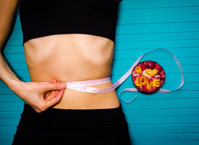 woman flat belly weight loss concept, ways to flatten your belly in 14 days