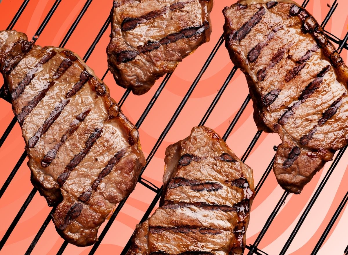 Grilled steaks on graphic background