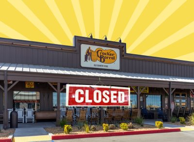 a photo of a cracker barrel restaurant storefront with a big "closed" sign on a designed yellow striped background