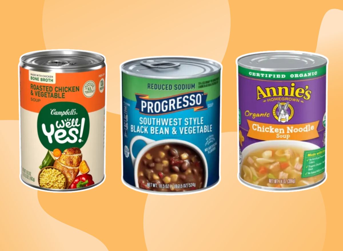 three cans of soup on an orange background