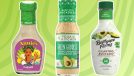 three bottles of salad dressings on a green background