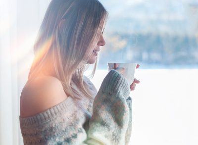 woman holding coffee