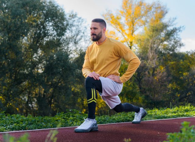 man doing walking lunges, concept of strength exercises to prevent muscle loss