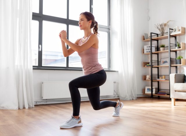 woman doing walking lunges, concept of quick and easy vacation workouts to stay on track