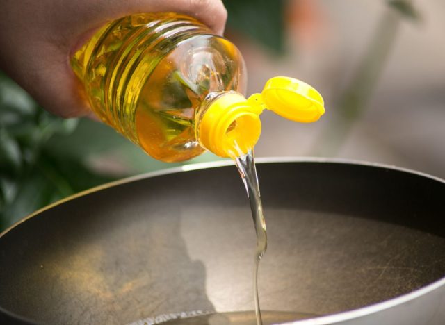 pouring oil in a pan