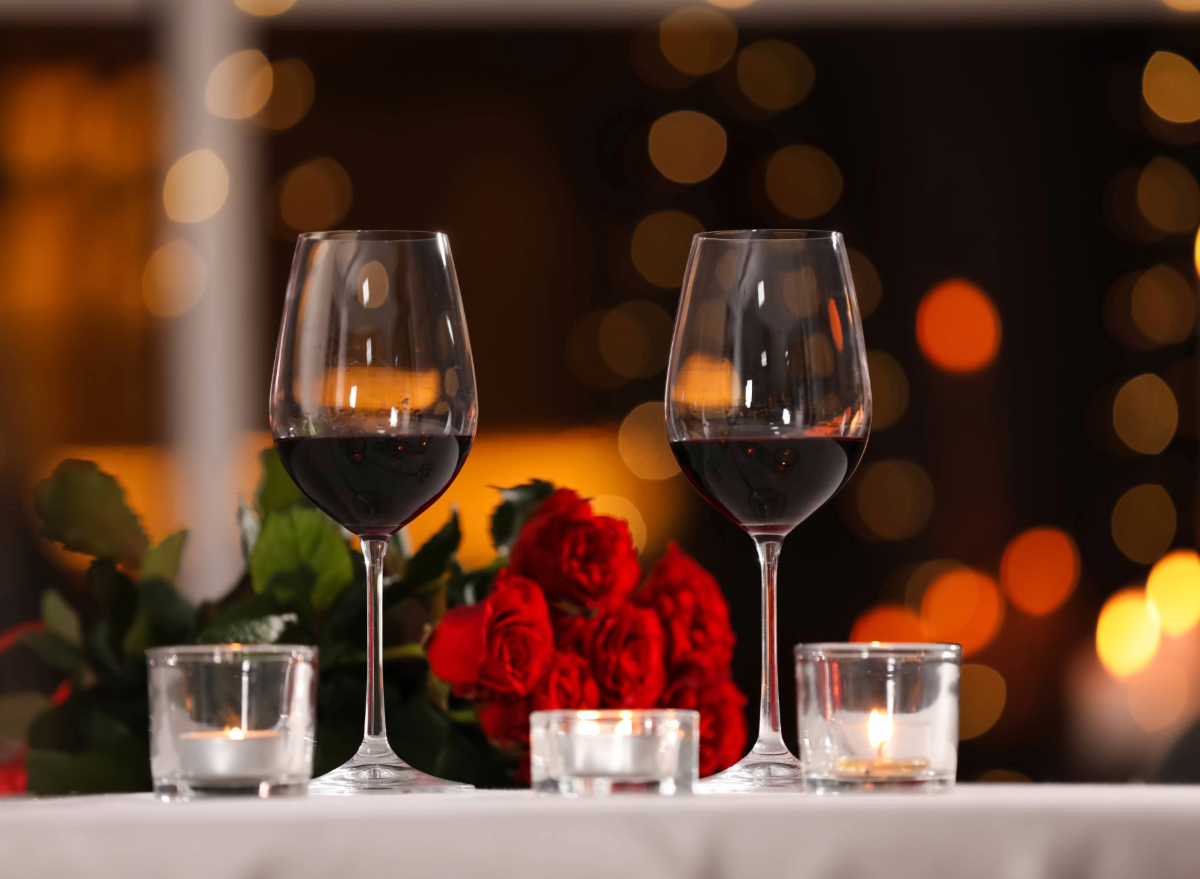 romantic table setting with red wine