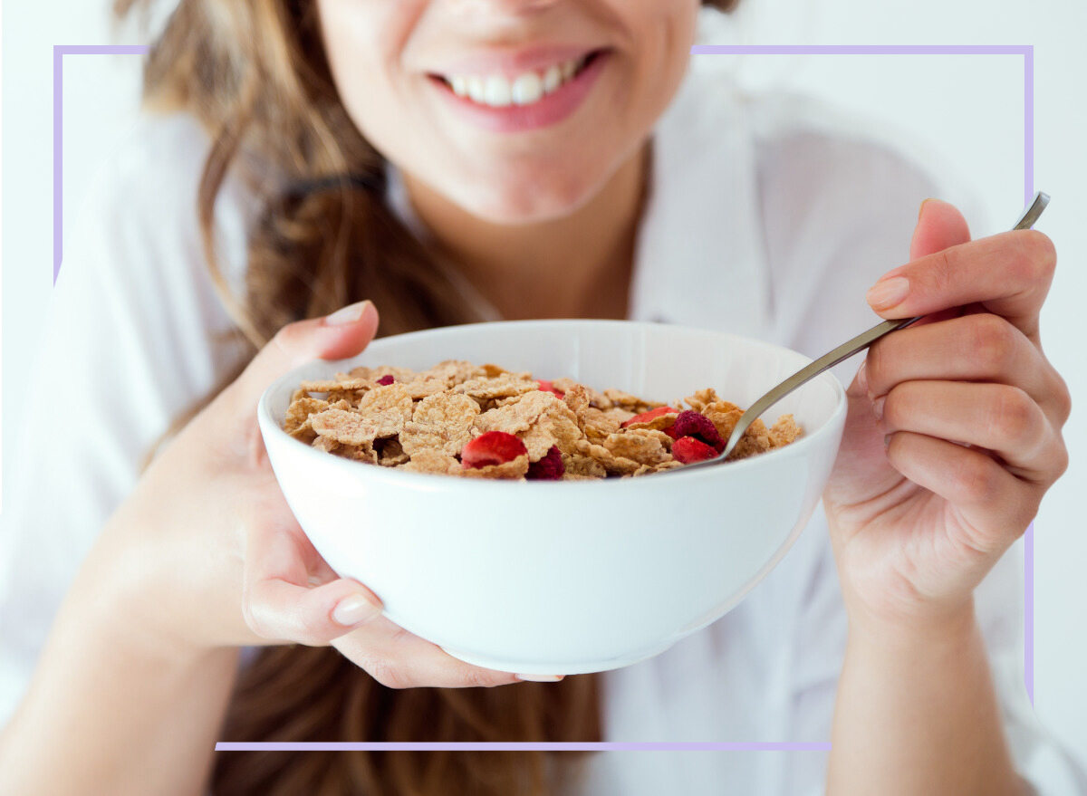 Woman eating a bowl of cereal