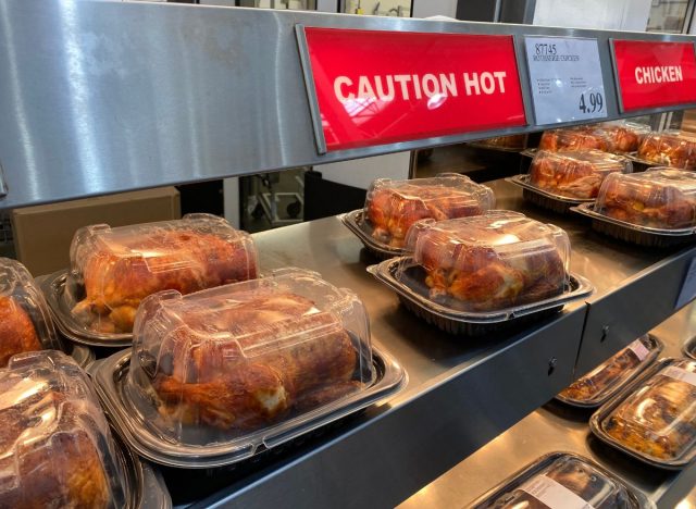 Costco rotisserie chickens lined up on shelves