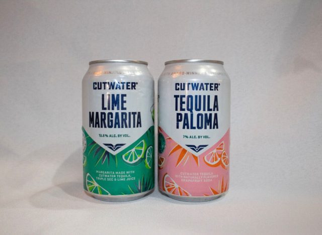 two cans of Cutwater cocktails on a white background