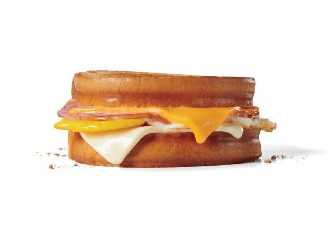 sourdough breakfast sandwich on a white background