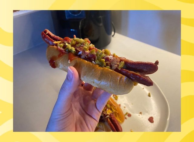 hot dog in a bun on a yellow background