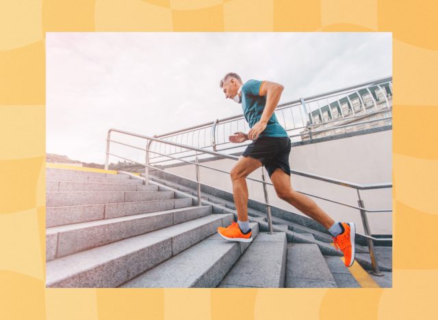 middle age man running up steps outside