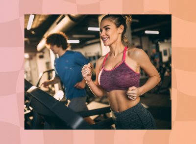 fit brunette woman doing treadmill run at the gym