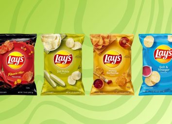 assorted bags of lays chips on green background