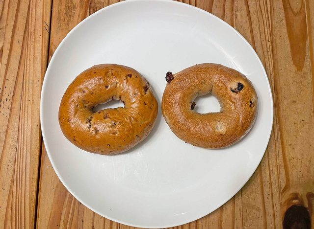 A pair of cinnamon and raisin-flavored bagels from Panera Bread (left) and Einstein Bros (right)