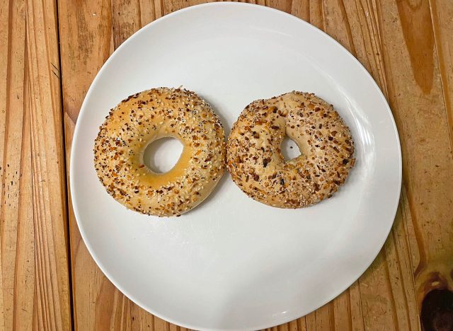 A pair of everything-seasoned bagels from Panera Bread (left) and Einstein Bros. (right)
