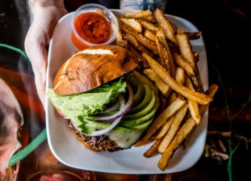 Kuma's Corner burger and fries on plate