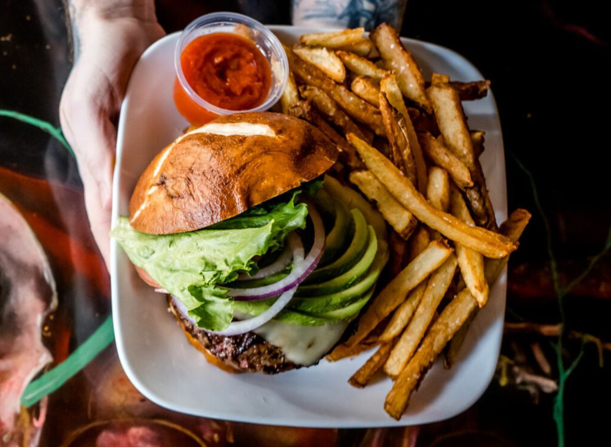 Kuma's Corner burger and fries on plate