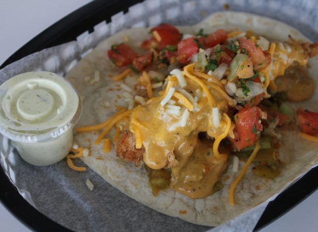 Torchy's trailer park taco in a plastic basket