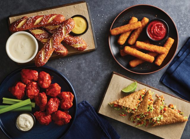 a selection of applebee's appetizers on plates