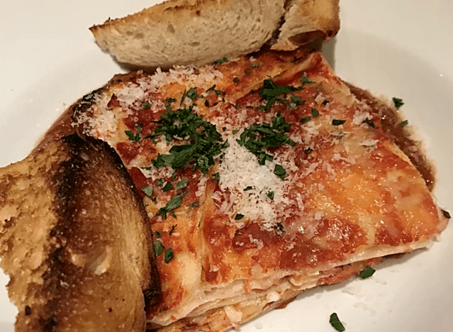 catelli's lasagna with bread on a plate