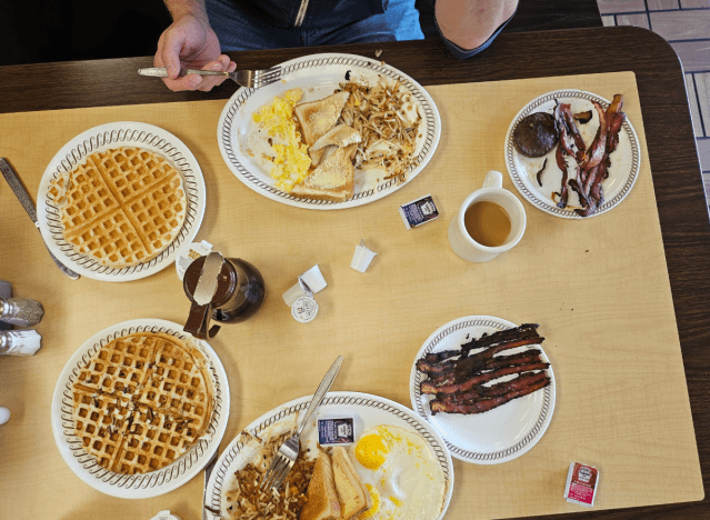people eating at waffle house