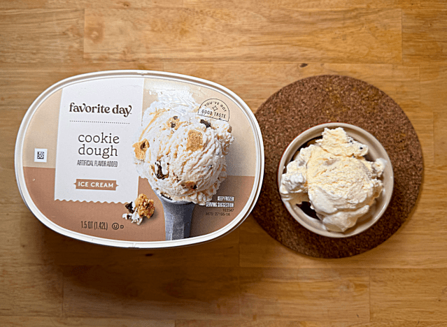 a container of favorite day cookie dough ice cream with a bowl of ice cream 