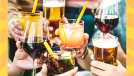 group of people cheers with alcoholic drinks like wine cocktails and beer