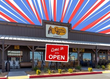 a photo of a cracker barrel storefront with an 'open' sign on a red, white, and blue striped background