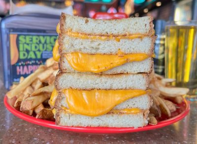 melt bar & grilled grilled cheese sandwich on a plate with fries