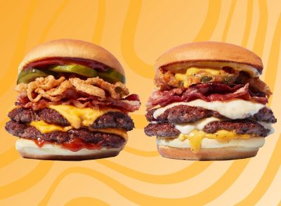 shake shack smoky classic bbq burger and carolina bbq burger over a designed orange background
