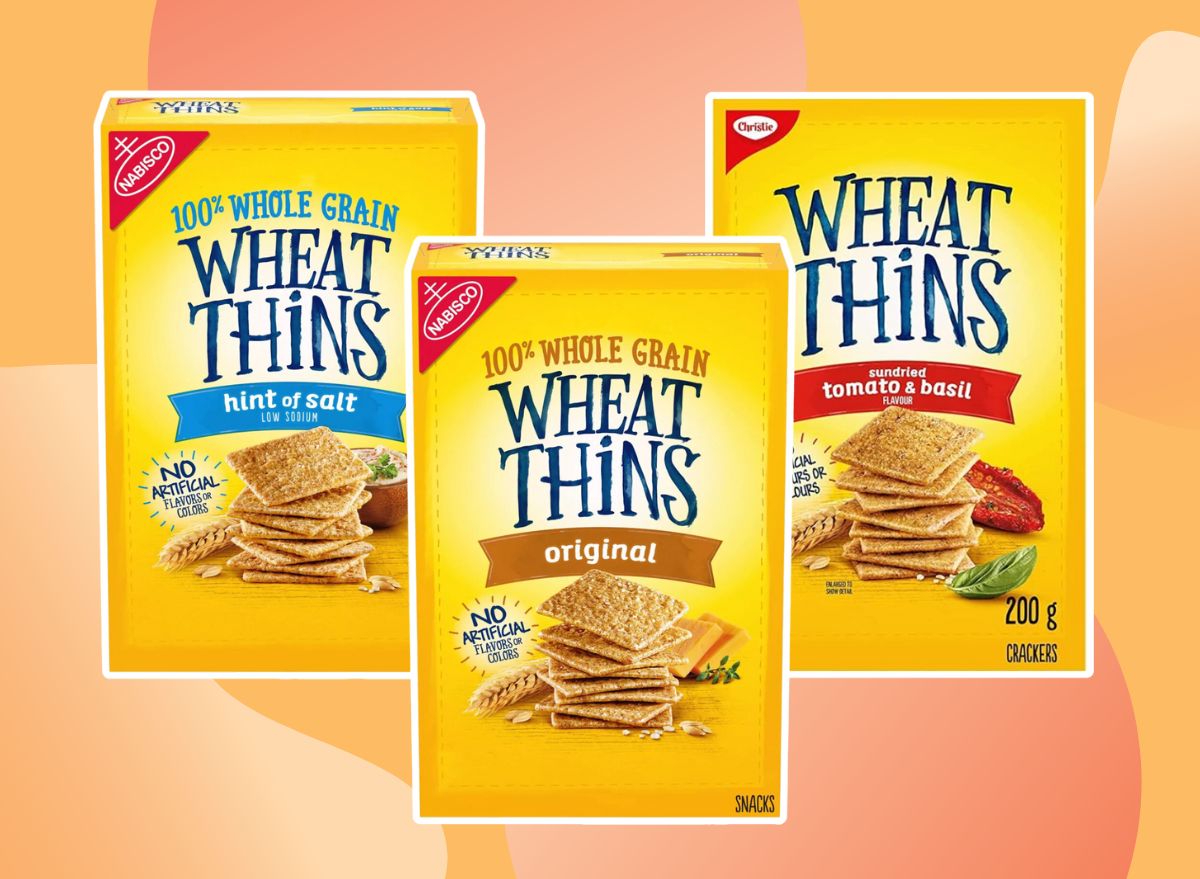 three boxes of Wheat Thins on a yellow and red background