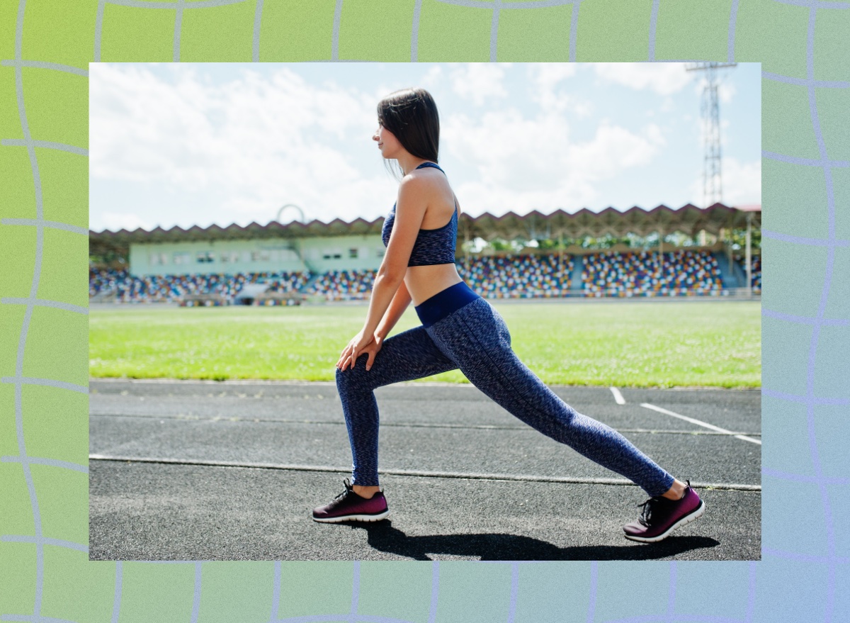 woman doing lunges on track