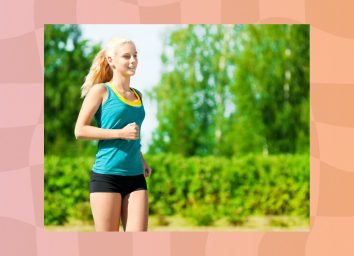 fit woman doing an interval walking workout outdoors on sunny day, surrounded by greenery
