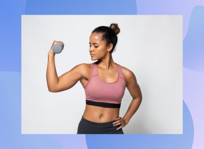 woman lifting dumbbell