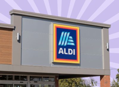 Aldi storefront on striped purple background