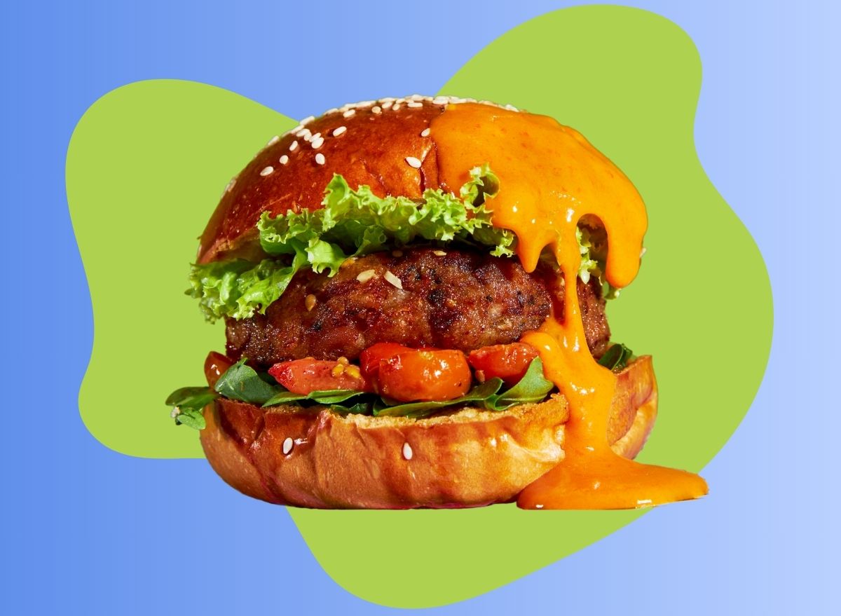 Saucy burger on a graphic background