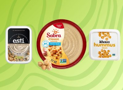 A trio of hummus brands set against a vibrant green background