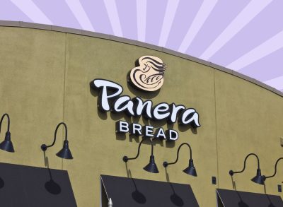 Panera Bread storefront on striped purple background