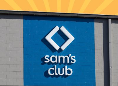 Sam's Club exterior with striped orange background