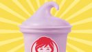 Wendy's new triple berry frosty set against a vibrant yellow background.
