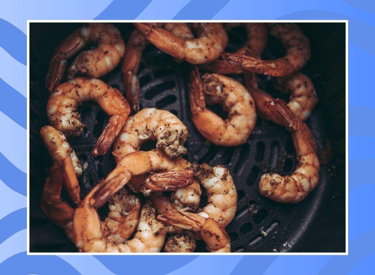 cooked shrimp inside an air fryer