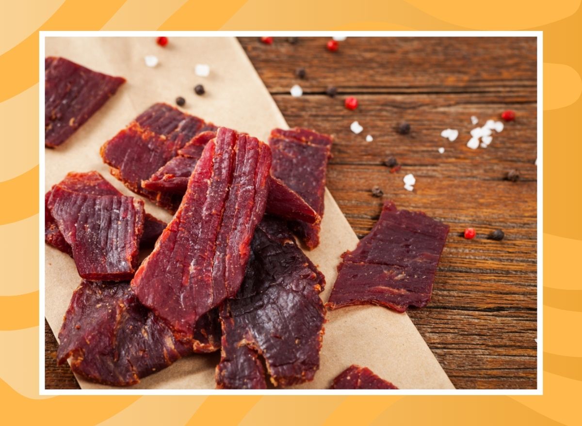 pile of beef jerky on an orange background