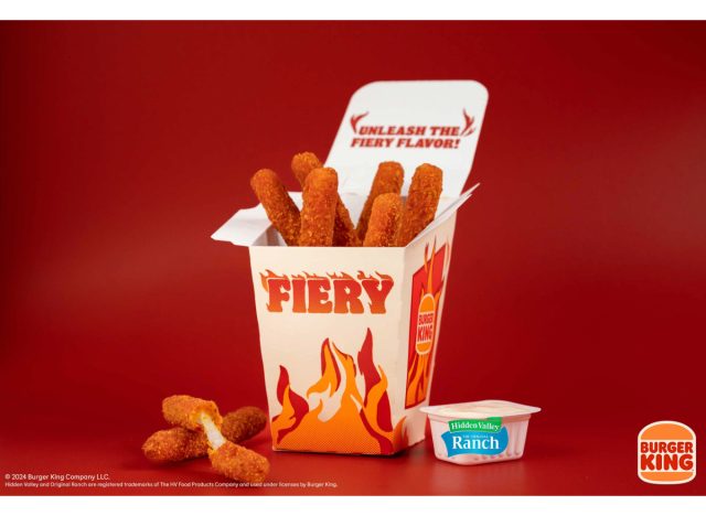 burger king fiery mozzarella fries with hidden valley ranch dip cup on a red background