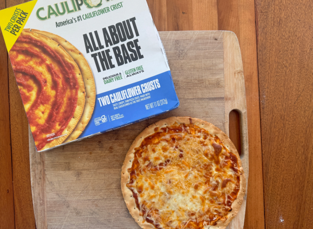 a cauliflower pizza crust and box 